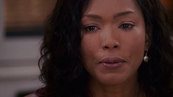 Movie still from “Meet the Browns” (2008), directed by Tyler Perry – A person with a tear in her eye; Close Up shot, Overhead angle