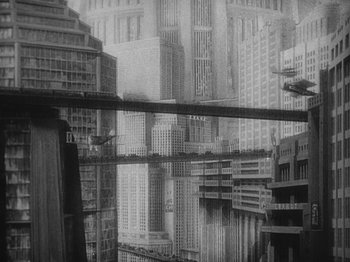 Movie still from “Metropolis” (1927), directed by Fritz Lang – A black - and - white photo of a city with skyscrapers; Extreme Wide shot, High angle
