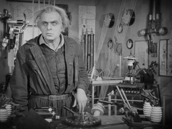 Movie still from “Metropolis” (1927), directed by Fritz Lang – An old photo of an old man in a workshop; Medium shot, Low angle