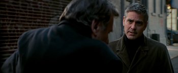 Movie still from “Michael Clayton” (2007), directed by Tony Gilroy – Two older men talking to each other outside; Close Up shot, Over the shoulder angle