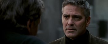 Movie still from “Michael Clayton” (2007), directed by Tony Gilroy – A person talking to another person; Close Up shot, Over the shoulder angle