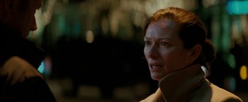 Movie still from “Michael Clayton” (2007), directed by Tony Gilroy – A person wearing a coat; Close Up shot, Over the shoulder angle