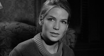 Movie still from “Mickey One” (1965), directed by Arthur Penn – Black and white photograph of a young woman in a sweater; Close Up shot, High angle