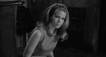 Movie still from “Mickey One” (1965), directed by Arthur Penn – A black - and - white photo of a young woman; Close Up shot, Low angle