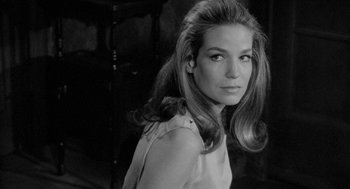 Movie still from “Mickey One” (1965), directed by Arthur Penn – Black and white photograph of a woman with long hair; Close Up shot, Over the shoulder angle