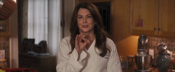 Movie still from “Middle School: The Worst Years of My Life” (2016), directed by Steve Carr – A woman in a white lab coat holding her hand up to her face; Close Up shot, Over the shoulder angle