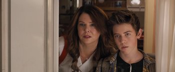 Movie still from “Middle School: The Worst Years of My Life” (2016), directed by Steve Carr – A woman standing next to a young boy in front of a window; Close Up shot, Over the shoulder angle