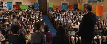 Movie still from “Middle School: The Worst Years of My Life” (2016), directed by Steve Carr – A group of people sitting in front of an audience; Wide shot, High angle