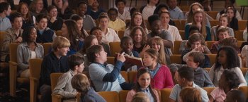 Movie still from “Middle School: The Worst Years of My Life” (2016), directed by Steve Carr – A group of people sitting in a room; Wide shot, High angle