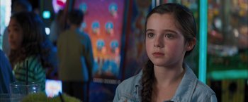 Movie still from “Middle School: The Worst Years of My Life” (2016), directed by Steve Carr – A young girl is looking into the distance; Close Up shot, Over the shoulder angle