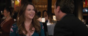 Movie still from “Middle School: The Worst Years of My Life” (2016), directed by Steve Carr – A woman sitting next to a man at a table; Close Up shot, Over the shoulder angle