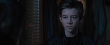 Movie still from “Middle School: The Worst Years of My Life” (2016), directed by Steve Carr – A young man in a leather jacket looking at the camera; Close Up shot, Over the shoulder angle