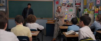 Movie still from “Middle School: The Worst Years of My Life” (2016), directed by Steve Carr – A man standing in front of a class room; Wide shot, Over the shoulder angle