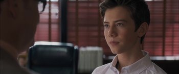 Movie still from “Middle School: The Worst Years of My Life” (2016), directed by Steve Carr – A person wearing a white shirt; Close Up shot, Over the shoulder angle