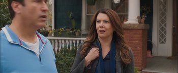 Movie still from “Middle School: The Worst Years of My Life” (2016), directed by Steve Carr – A person standing outside of a house; Medium shot, Over the shoulder angle