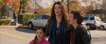 Movie still from “Middle School: The Worst Years of My Life” (2016), directed by Steve Carr – A woman standing next to two young children; Medium shot, Over the shoulder angle