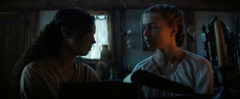 Movie still from “Fear Street: Part Three - 1666” (2021), directed by Leigh Janiak – Two women are talking in a room; Close Up shot, Over the shoulder angle