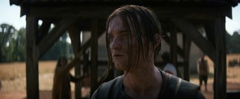 Movie still from “Fear Street: Part Three - 1666” (2021), directed by Leigh Janiak – A person with long brown hair; Close Up shot, Low angle