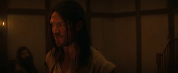 Movie still from “Fear Street: Part Three - 1666” (2021), directed by Leigh Janiak – A person with long black hair; Close Up shot, Over the shoulder angle