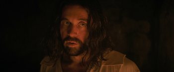 Movie still from “Fear Street: Part Three - 1666” (2021), directed by Leigh Janiak – A person with long hair; Close Up shot, Over the shoulder angle