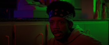 Movie still from “Fear Street: Part Three - 1666” (2021), directed by Leigh Janiak – A man with a bandanna on his head; Close Up shot, Low angle