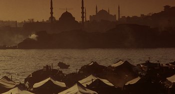Movie still from “Midnight Express” (1978), directed by Alan Parker – A large body of water near a large city; Extreme Wide shot, High angle