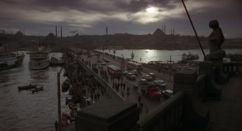 Movie still from “Midnight Express” (1978), directed by Alan Parker – A view of a bridge with a lot of cars on it; Extreme Wide shot, High angle