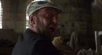 Movie still from “Midnight Express” (1978), directed by Alan Parker – A person wearing a hat; Close Up shot, Low angle