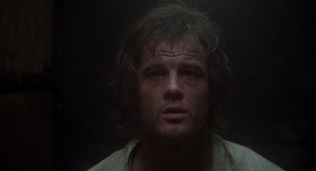 Movie still from “Midnight Express” (1978), directed by Alan Parker – A person with wet hair; Close Up shot, Low angle