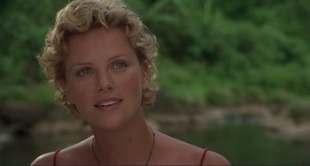 Movie still from “Mighty Joe Young” (1998), directed by Ron Underwood – A person with short hair; Close Up shot, Over the shoulder angle