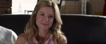 Movie still from “Mike and Dave Need Wedding Dates” (2016), directed by Jake Szymanski – A person wearing a pink shirt; Close Up shot, Over the shoulder angle