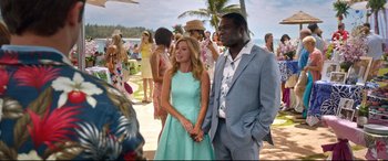 Movie still from “Mike and Dave Need Wedding Dates” (2016), directed by Jake Szymanski – A man and a woman holding hands while standing next to each other; Medium shot, Over the shoulder angle