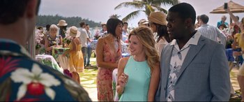 Movie still from “Mike and Dave Need Wedding Dates” (2016), directed by Jake Szymanski – A group of people standing next to each other on a beach; Medium shot, Over the shoulder angle