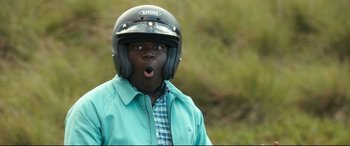 Movie still from “Mike and Dave Need Wedding Dates” (2016), directed by Jake Szymanski – A person wearing a helmet and looking surprised; Close Up shot, Over the shoulder angle
