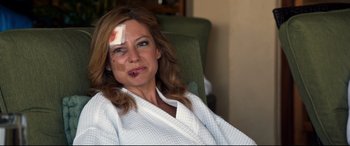 Movie still from “Mike and Dave Need Wedding Dates” (2016), directed by Jake Szymanski – A woman with a bandage on her forehead; Close Up shot, Over the shoulder angle