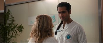 Movie still from “Mike and Dave Need Wedding Dates” (2016), directed by Jake Szymanski – A man and a woman talking in front of a mirror; Close Up shot, Over the shoulder angle