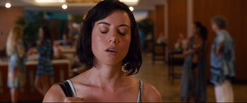 Movie still from “Mike and Dave Need Wedding Dates” (2016), directed by Jake Szymanski – A woman with her eyes closed in a room; Close Up shot, High angle