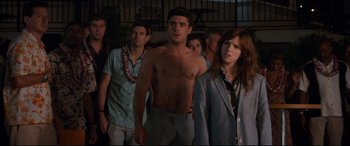 Movie still from “Mike and Dave Need Wedding Dates” (2016), directed by Jake Szymanski – A group of people standing next to each other; Medium shot, Over the shoulder angle