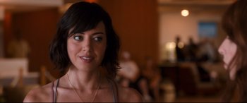Movie still from “Mike and Dave Need Wedding Dates” (2016), directed by Jake Szymanski – A person wearing a necklace; Close Up shot, Over the shoulder angle