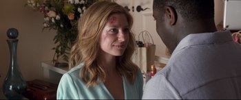 Movie still from “Mike and Dave Need Wedding Dates” (2016), directed by Jake Szymanski – A young woman with a bruise on her face; Close Up shot, Over the shoulder angle