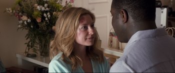 Movie still from “Mike and Dave Need Wedding Dates” (2016), directed by Jake Szymanski – A woman with a red spot on her cheek; Close Up shot, Over the shoulder angle