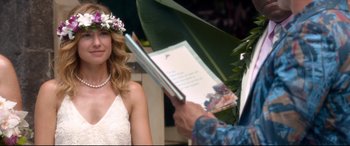 Movie still from “Mike and Dave Need Wedding Dates” (2016), directed by Jake Szymanski – A man reading a book to a woman in a white dress; Close Up shot, Over the shoulder angle