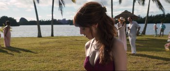 Movie still from “Mike and Dave Need Wedding Dates” (2016), directed by Jake Szymanski – A beautiful young lady wearing a purple bikini top; Medium shot, Over the shoulder angle