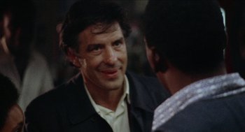 Movie still from “Mikey and Nicky” (1976), directed by Elaine May – A person talking to another person; Close Up shot, Over the shoulder angle
