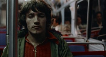 Movie still from “Mikey and Nicky” (1976), directed by Elaine May – A man sitting on a bus with his eyes closed; Close Up shot, Low angle