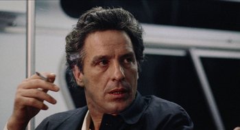 Movie still from “Mikey and Nicky” (1976), directed by Elaine May – A person wearing a black shirt; Close Up shot, Low angle