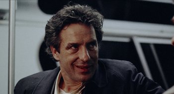 Movie still from “Mikey and Nicky” (1976), directed by Elaine May – A person wearing a jacket; Close Up shot, Low angle