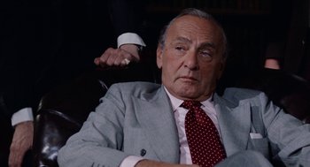 Movie still from “Mikey and Nicky” (1976), directed by Elaine May – An older man wearing a suit and tie; Close Up shot, Low angle