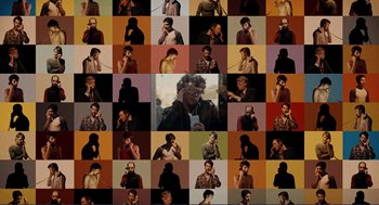 Movie still from “Milk” (2008), directed by Gus Van Sant – A collage of different people with different faces; Extreme Wide shot, Overhead angle