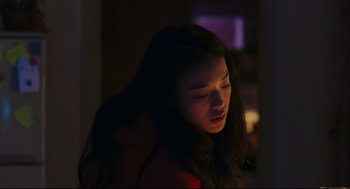 Movie still from “Millennium Mambo” (2001), directed by Hsiao-Hsien Hou – A woman with long hair is standing in the dark; Close Up shot, Low angle